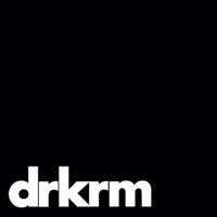 drkrm logo white text on black background